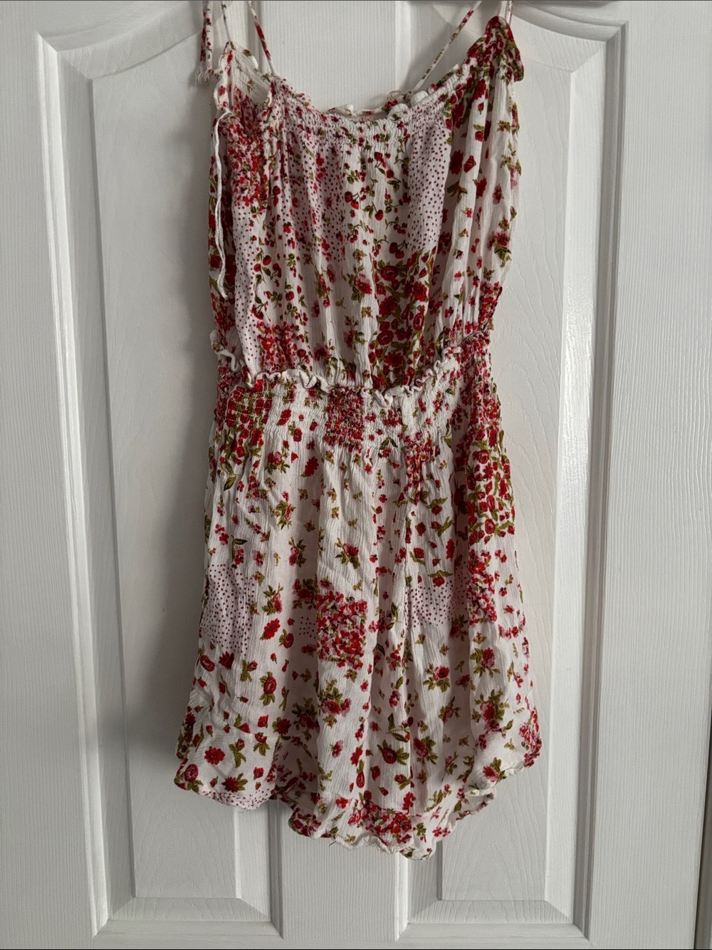 Black Tape_ White Floral Romper with Red and Green Print